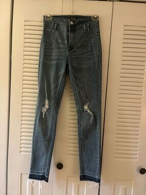 BEBE Ripped Skinny Jeans in Faded Blue